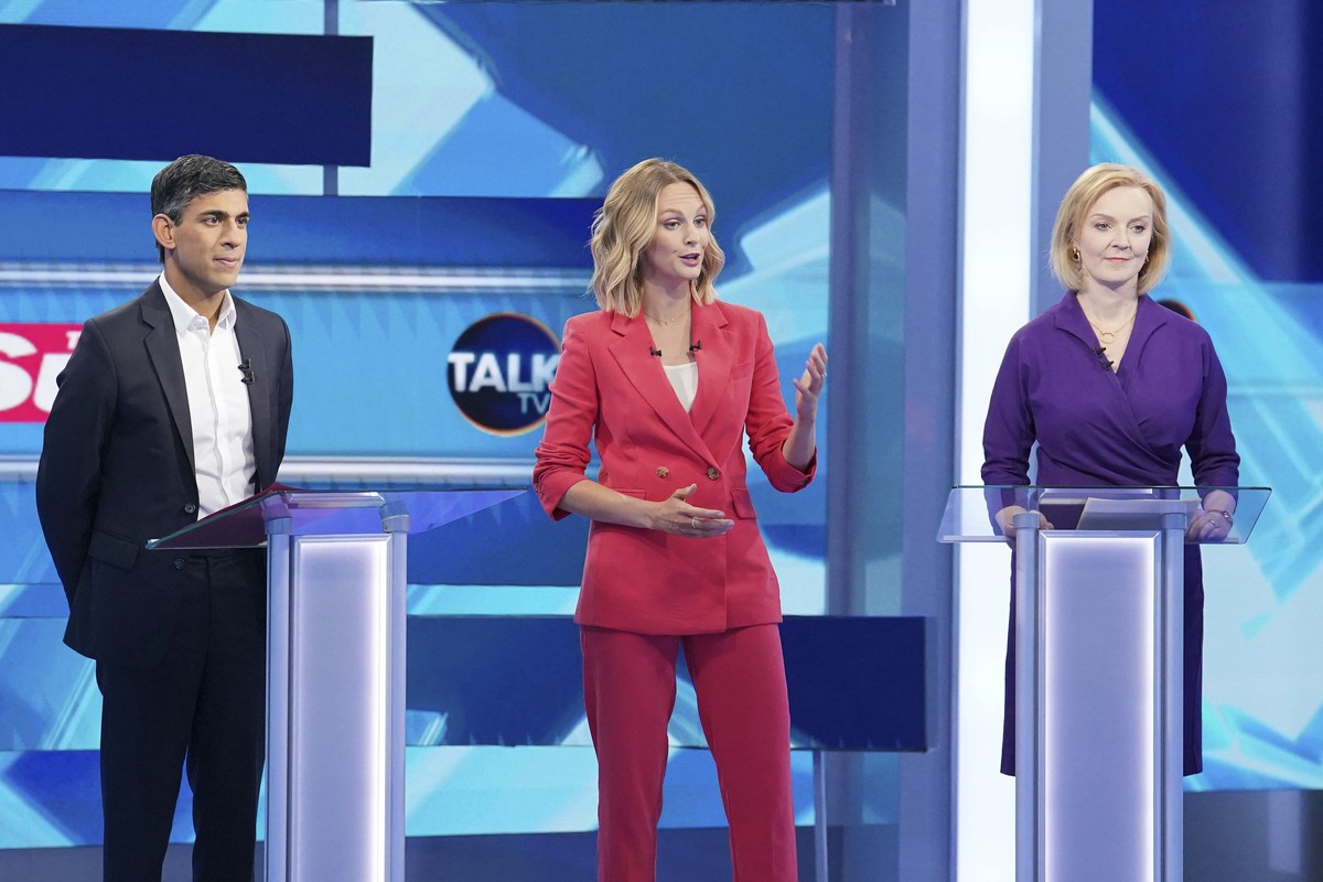 Liz Truss, right, and Rishi Sunak with host TalkTV Political Editor Kate McCann during The Sun's Showdown, the fight for No10, the latest head-to-head debate for the Conservative Party leader can ...