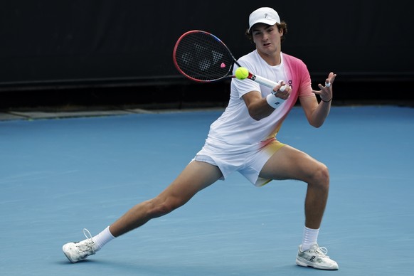 epa11827961 Joao Fonseca of Brazil in action during his Men&#039;s round 2 match against Lorenzo Sonego of Italy at the Australian Open tennis tournament in Melbourne, Australia, 16 January 2025. EPA/ ...