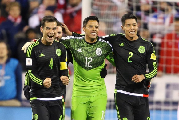 Nov 11, 2016; Columbus, OH, USA; Mexico defender Rafael Marquez (4) and teammates Alfredo Talavera (12) and Hugo Ayala (2) celebrate following the second half against the USA at MAPFRE Stadium. Mexico ...