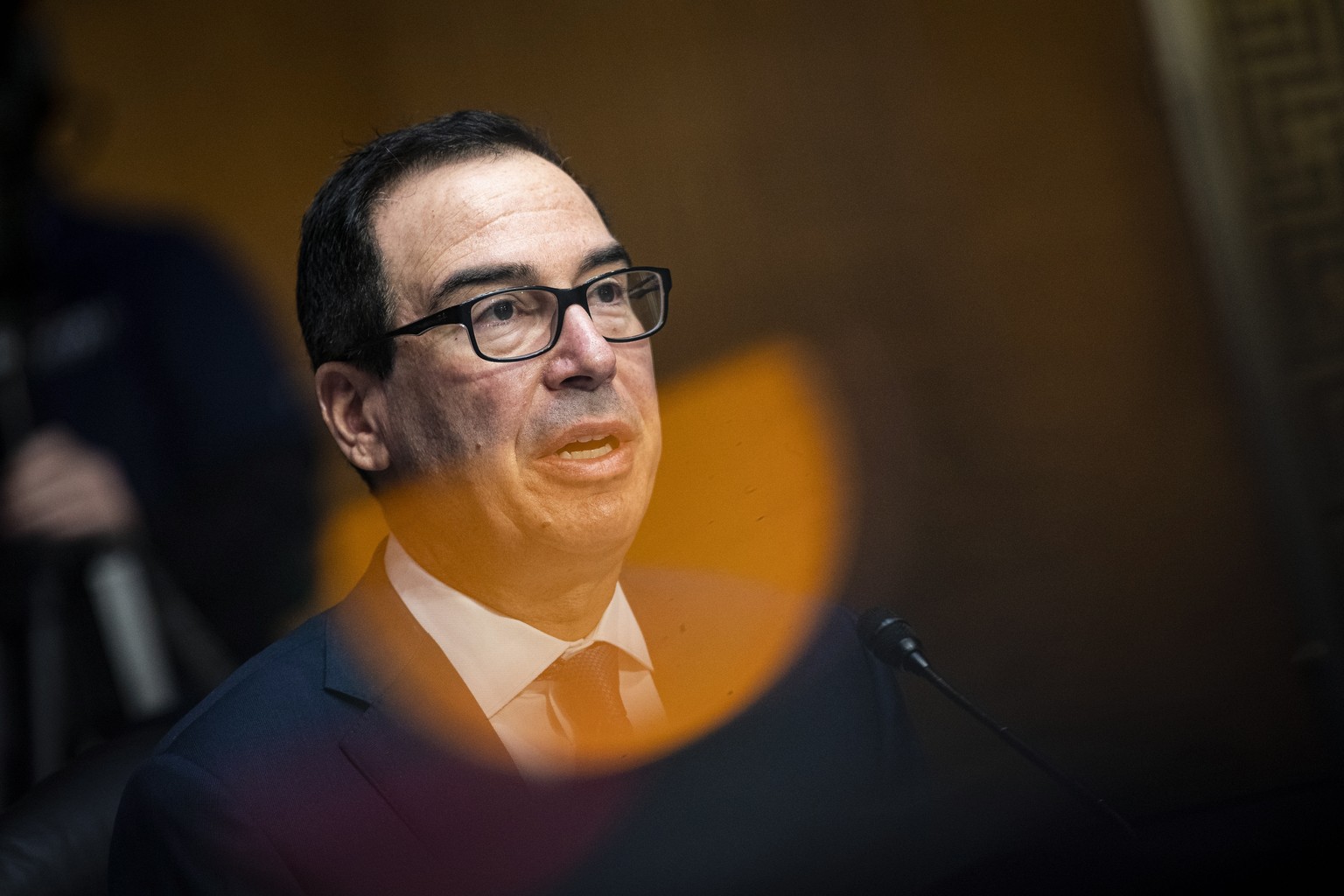 epa08855224 US Treasury Secretary Steven Mnuchin speaks during a Senate Banking Committee hearing on Capitol Hill, in Washington, DC, USA, 01 December 2020. EPA/AL DRAGO / POOL