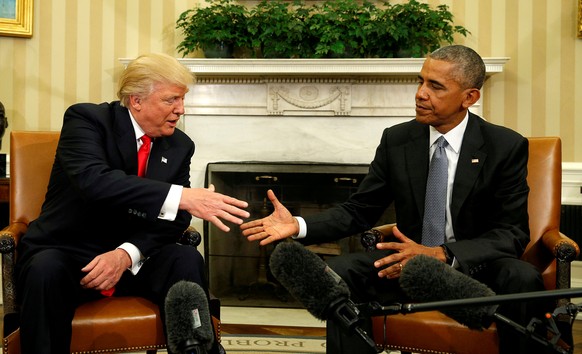 FILE PHOTO - U.S. President Barack Obama meets with President-elect Donald Trump in the Oval Office of the White House in Washington November 10, 2016. REUTERS/Kevin Lamarque/File Photo TPX IMAGES OF  ...