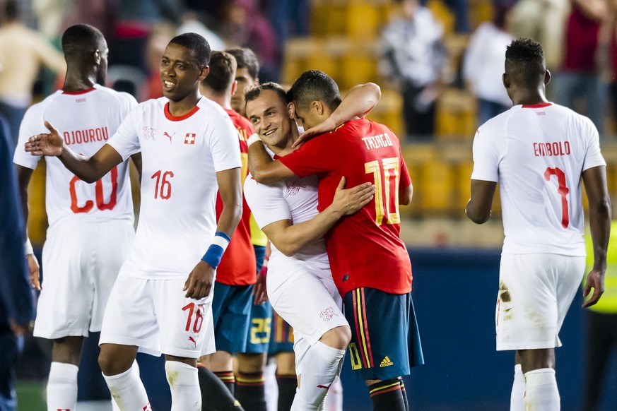 Switzerland&#039;s midfielder Gelson Fernandes, left, Switzerland&#039;s midfielder Xherdan Shaqiri, center, and Switzerland&#039;s forward Breel Embolo, right, react with Spain&#039;s midfielder Thia ...