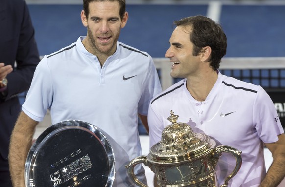 epa06297060 The award ceremony after the final between Switzerland&#039;s Roger Federer, right, and Argentina&#039;s Juan Martin del Potro, lfet, at the Swiss Indoors tennis tournament at the St. Jako ...