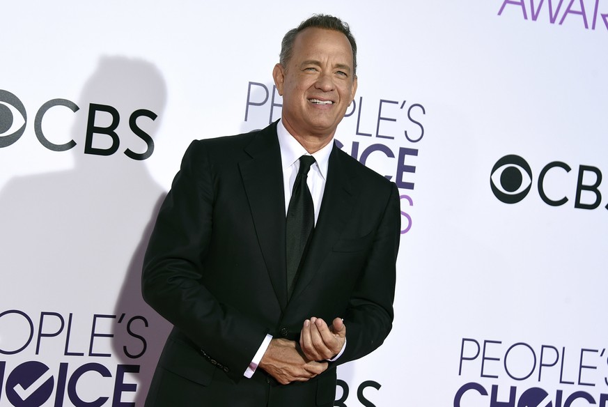 FILE - In this Wednesday, Jan. 18, 2017, file photo, Tom Hanks arrives at the People&#039;s Choice Awards at the Microsoft Theater in Los Angeles. The Oscar-winning actor’s first book, “UNCOMMON TYPE: ...