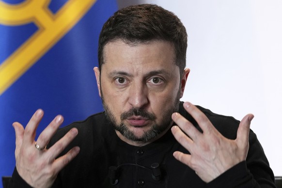 Ukraine&#039;s President Volodymyr Zelenskyy speaks during a press conference after the so-called &quot;Coalition of the willing&quot; summit, Thursday, March 27, 2025 in Paris. (AP Photo/Aurelien Mor ...