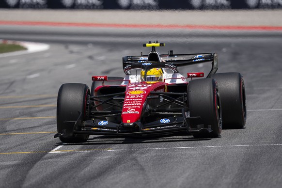 epa13036751 Ferrari F1 driver Lewis Hamilton of Britain during during the Barcelona-Catalunya GP race at Circuit de Barcelona-Catalunya track in Barcelona, northeastern Spain, 14 June 2026. EPA/Siu Wu