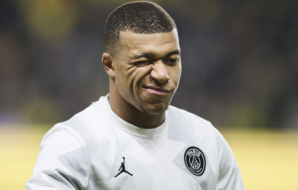 PSG's Kylian Mbappe walks onto the pitch prior to the League One soccer match between Nantes and Paris-Saint-Germain, in Nantes, western France, Tuesday, Feb. 4, 2020. (AP Photo/David Vincent)