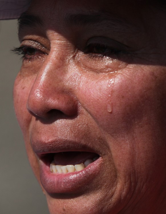 Maria Martines, whose son went missing as he journeyed from Central America to the U.S., weeps during a visit to the Basilica de Guadalupe, in Mexico City, Saturday, Nov. 29, 2014. For the 10th year i ...