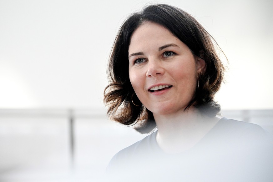 epa09144793 (FILE) - Green Party Chairwoman Annalena Baerbock speaks to the media during her visit of German pharmaceutical company Bayer and the associated Chempark in Leverkusen, Germany, 13 August  ...