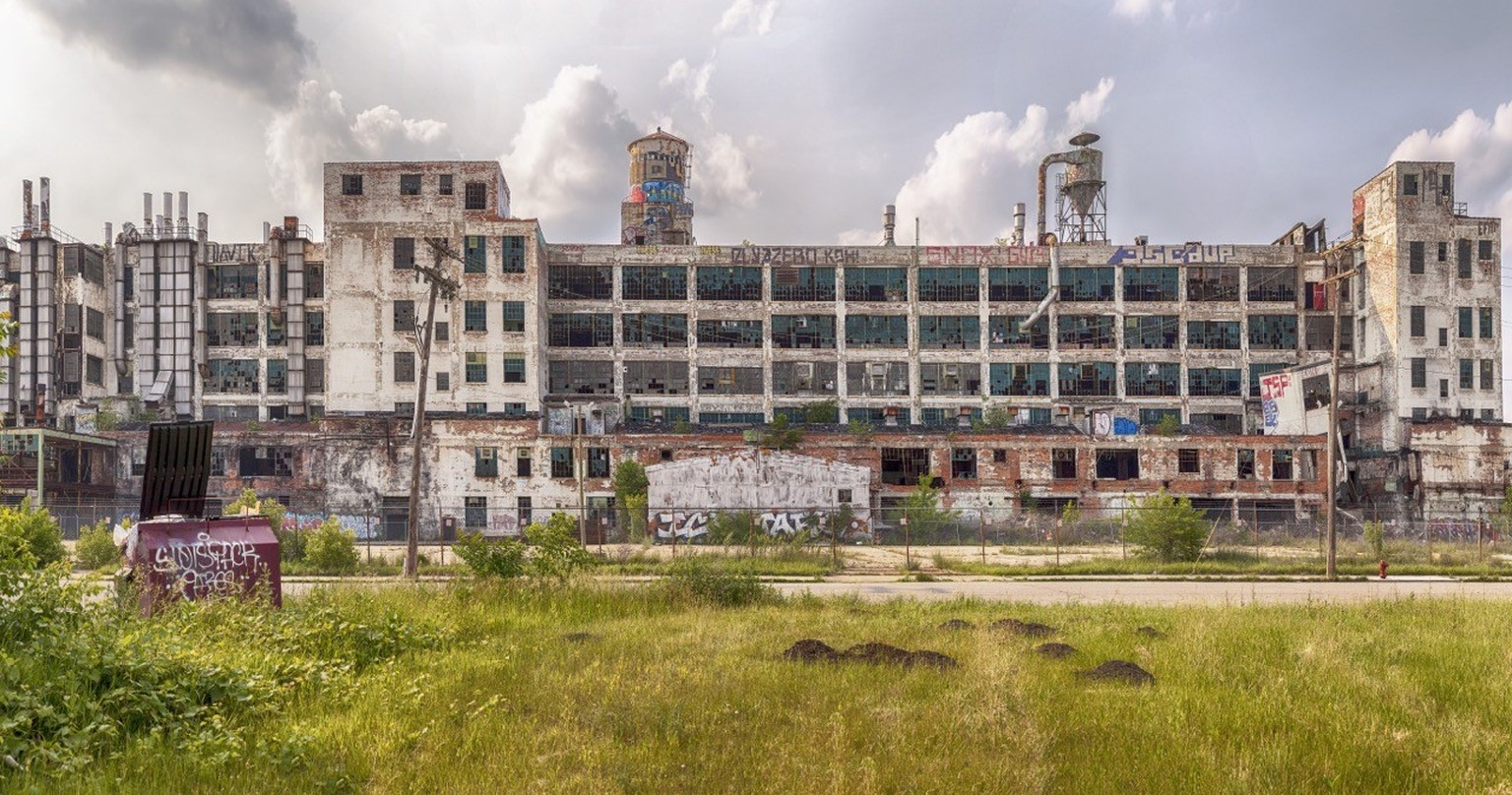 DETROIT, USA - JUNE 9, 2015: The Fisher Body Plant is now shut down and covered in graffiti but was used in automotive manufacturing until 1984. The building was designed by Albert Kahn in 1919.