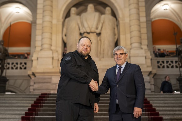 Ruslan Stefanchuk of Ukraine, Speaker of the Verkhovna Rada, the Parliament of Ukraine, left, is welcomed by Eric Nussbaumer, SP-BL, head of the Swiss National Council, during his visit of the Swiss P ...