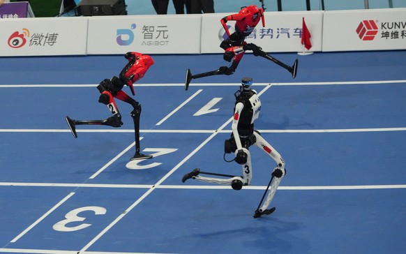 Humanoid robot competes in the 100m race during the World Humanoid Robot Games in Beijing, Tuesday, Aug. 25, 2026. (AP Photo/Achmad Ibrahim)
China Humanoid Robot Games