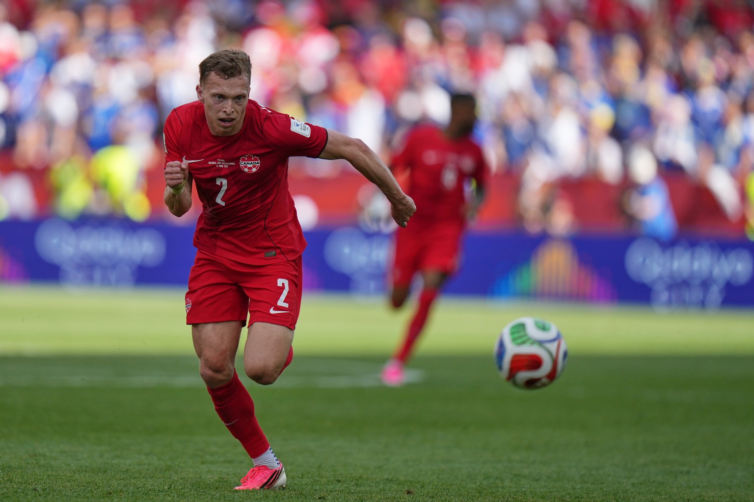 Canada's Alistair Johnston chases down a loose ball during the World Cup Group B soccer match between Canada and Bosnia in Toronto, Friday, June 12, 2026. (AP Photo/Stephanie Scarbrough)
Alistair ...