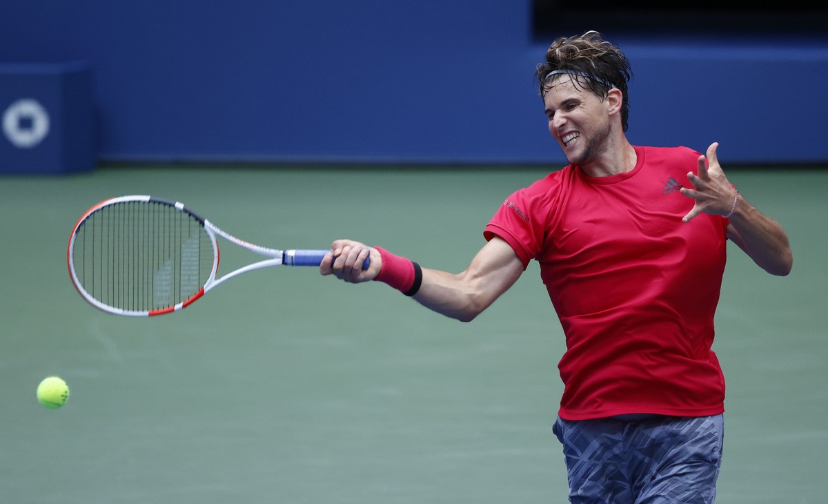 epa08653259 Dominic Thiem of Austria in action against Felix Auger-Aliassime of Canada during their match on the eighth day of the US Open Tennis Championships at the USTA National Tennis Center in Fl ...