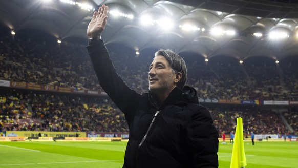 Switzerland&#039;s head coach Murat Yakin waves to the Swiss fans prior to the UEFA Euro 2024 qualifying group I soccer match between Romania and Switzerland at the National Arena stadium in Bucharest ...