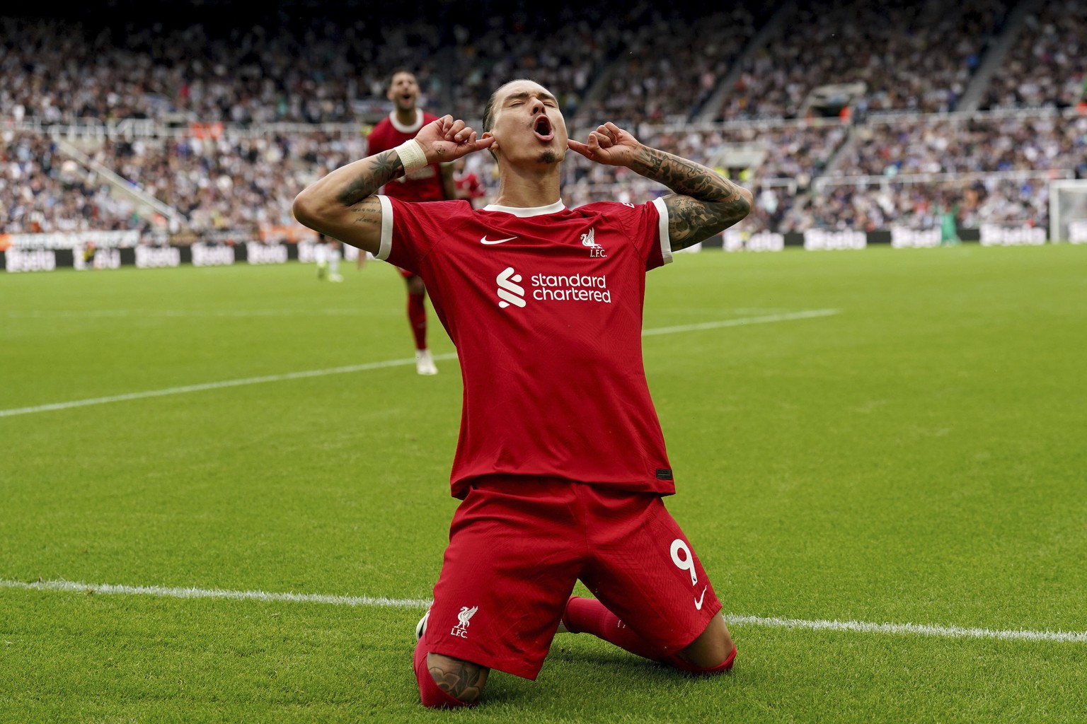 Liverpool&#039;s Darwin Nunez celebrates after scoring his sides first goal during the English Premier League soccer match between Newcastle United and Liverpool at St. James&#039; Park, in Newcastle  ...
