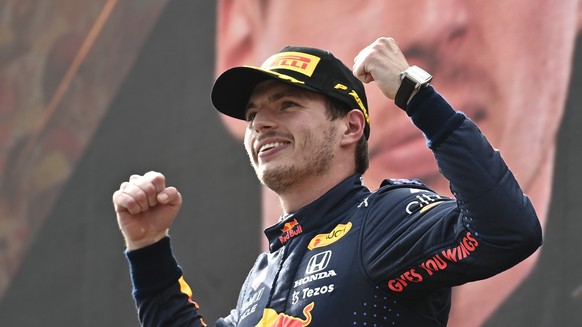 Red Bull driver Max Verstappen of the Netherlands jubilates on the podium after winning the Austrian Formula One Grand Prix at the Red Bull Ring racetrack in Spielberg, Austria, Sunday, July 4, 2021.  ...
