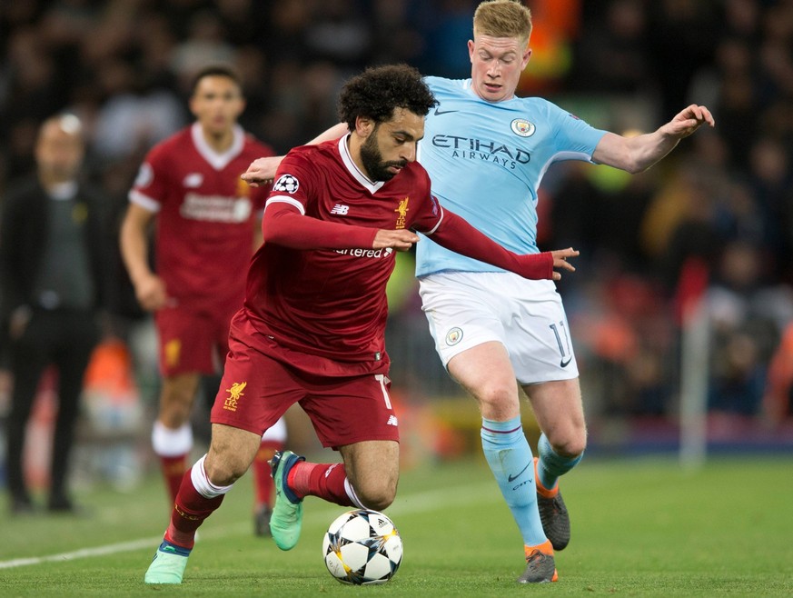 Liverpool v Manchester City UEFA Champions League Quarter Final Mohamed Salah of Liverpool (nearest) gets ahead of Kevin De Bruyne of Manchester City during the UEFA Champions League Quarter Final mat ...