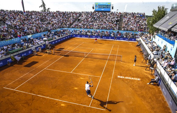 epa08483101 Viktor Troicki (front) of Serbia plays a backhand against Novak Djokovic of Serbia during their match for the Adria Tour tennis tournament in Belgrade, Serbia, 13 June 2020. The Adria Tour ...