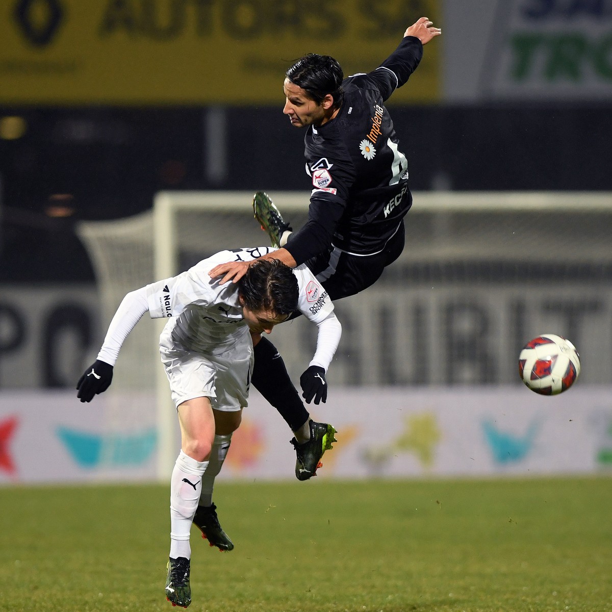 Lugano's player Akos Kecskes, right, fights for the ball with Vaduz' player Matteo Di Giusto, left, during the Super League soccer match FC Lugano against FC Vaduz, at the Cornaredo stadium  ...