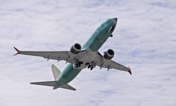 FILE - In this May 8, 2019, file photo, a Boeing 737 MAX 8 jetliner being built for Turkish Airlines takes off on a test flight in Renton, Wash. Boeing says it has finished with its updates to the fli ...