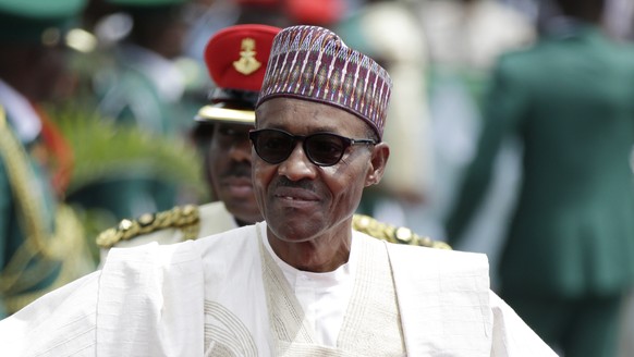 FILE- In this file photo taken Friday, May 29, 2015, Nigerian President elect, Muhammadu Buhari, arrives for his Inauguration at the eagle square in Abuja, Nigeria. The Boko Haram extremist group has  ...