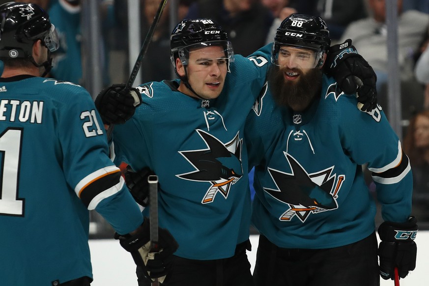 San Jose Sharks right wing Timo Meier (28) celebrates goal with defenseman Brent Burns (88) during the first period of an NHL hockey game against the Los Angeles Kings in San Jose, Calif., Saturday, M ...
