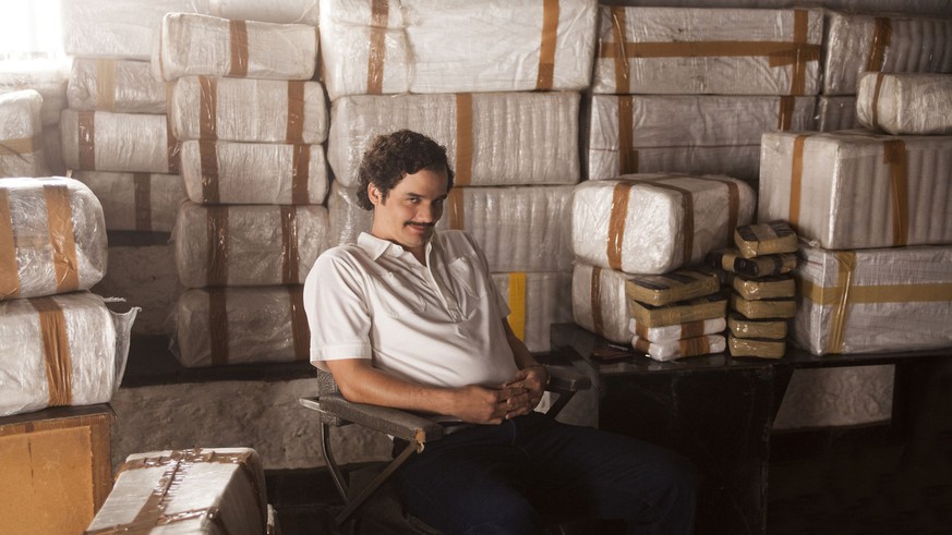 This image released by Netflix shows Wagner Moura as Pablo Escobar in the Netflix Original Series &quot;Narcos.&quot; The show has been named one of the 10 Best TV shows by The Associated Press. (Dani ...