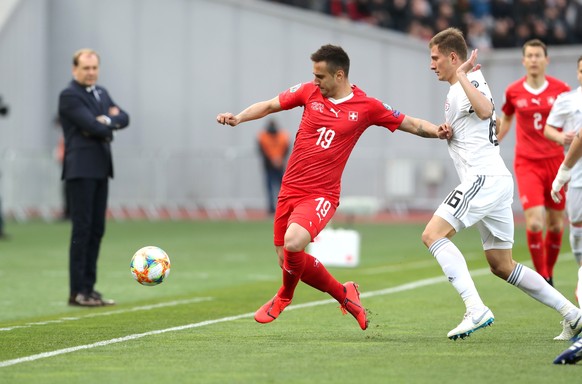 epa07458342 Switzerland&#039;s Mario Gavranovic (L) in action against Georgia&#039;s Jemal Tabidze (R) during the UEFA EURO 2020 Group D qualifier soccer match at the Boris Paichadze national stadium  ...