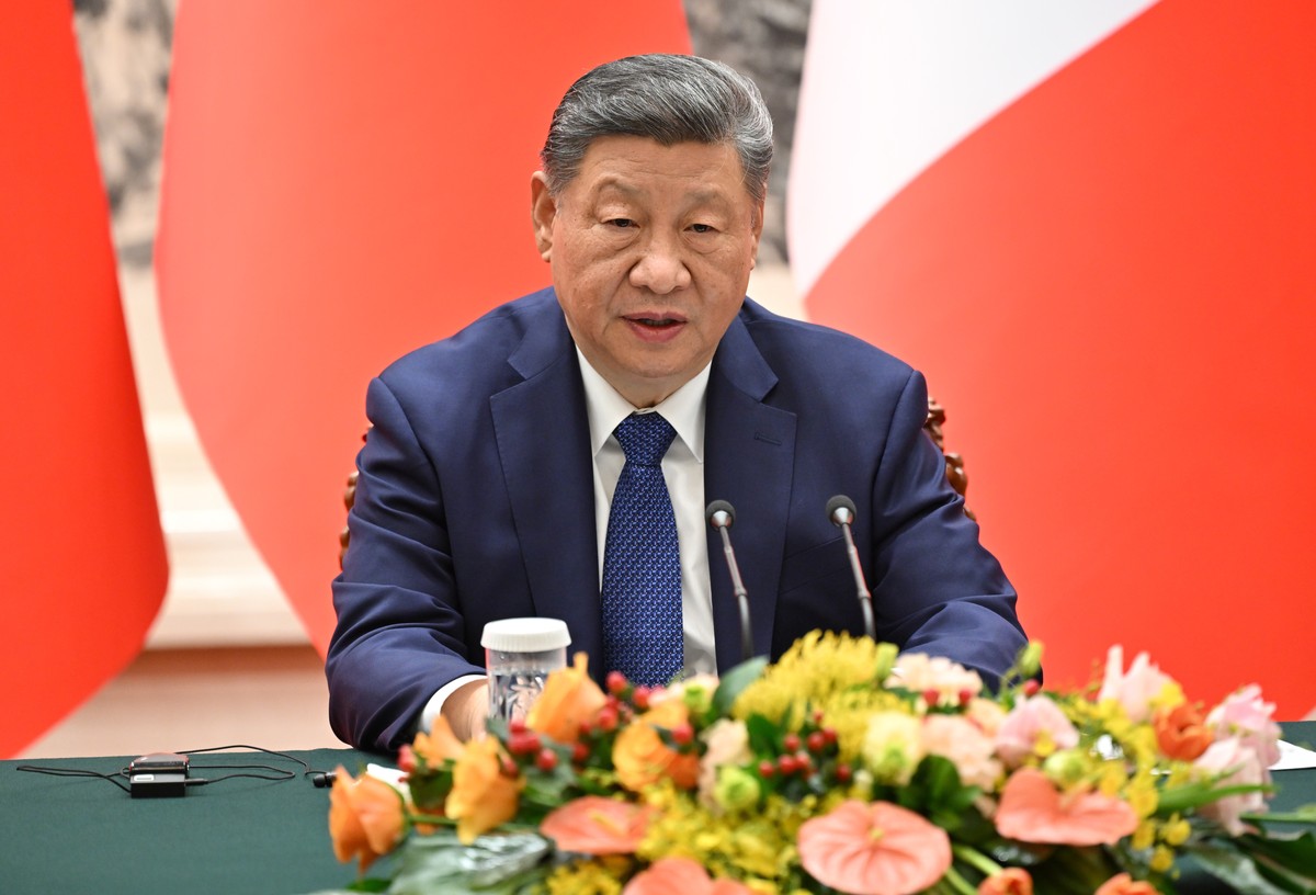 China's President Xi Jinping speaks during a joint press conference with France's President Emmanuel Macron at the Great Hall of the People in Beijing Thursday, Dec. 4, 2025. (Adek Berry/Poo ...
