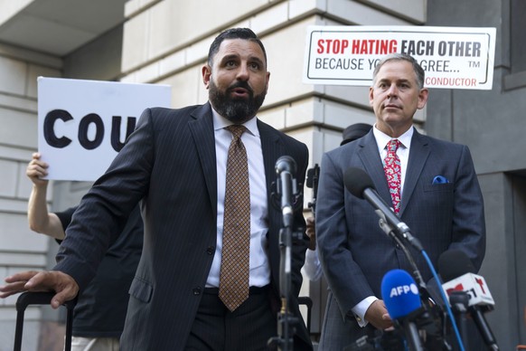 Attorneys for Enrique Tarrio, Nayib Hassan, left, and Sabino Jauregui speak to the media as they depart federal court, Tuesday, Sept. 5, 2023, in Washington. Former Proud Boys leader Enrique Tarrio ha ...