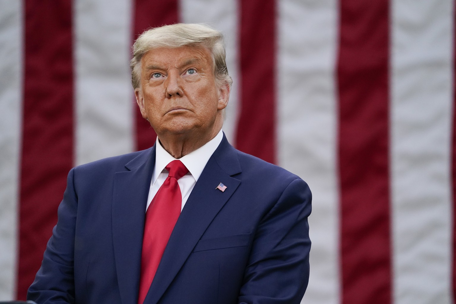 President Donald Trump listens attends an event on Operation Warp Speed in the Rose Garden of the White House, Friday, Nov. 13, 2020, in Washington. (AP Photo/Evan Vucci)
Donald Trump