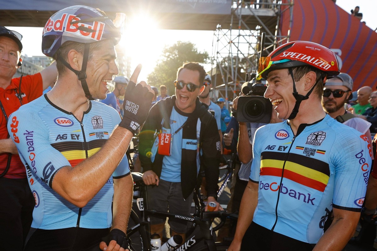 WOLLONGONG, AUSTRALIA - SEPTEMBER 25 : VAN AERT Wout BEL elite men road race congratulates EVENEPOEL Remco BEL elite men road race with his world title pictured during the 2022 UCI Road World Champion ...