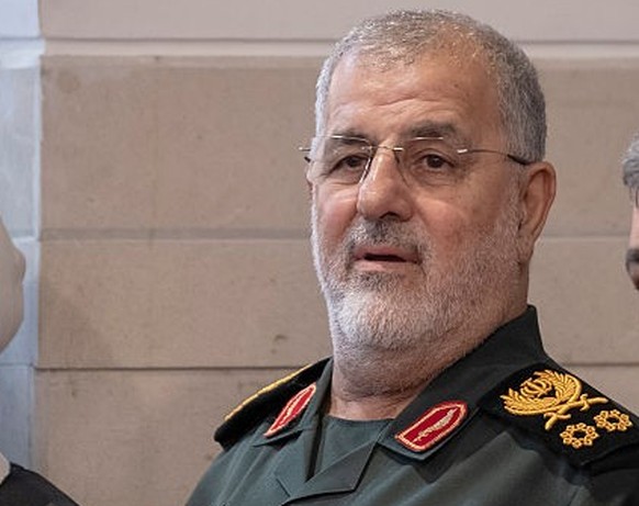 IRGC commander, Major General Mohammad Pakpour (center), participates in a ceremony to mark the memory of former IRGC commander Hossein Salami, who was killed in Israeli attacks, at a mosque in an IRG ...