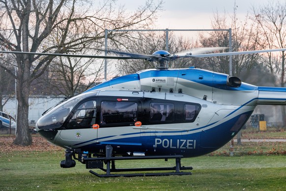 epa12516459 Defendant Taleb al-Abdulmohsen (C) sits in a police helicopter after the first day of his trial for murder in the 2024 Magdeburg Christmas market attack in Magdeburg, Germany, 10 November  ...