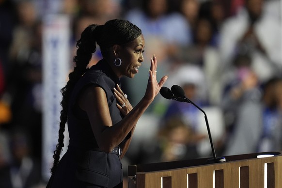 Former first lady Michelle Obama speaks during the Democratic National Convention Tuesday, Aug. 20, 2024, in Chicago. (AP Photo/Paul Sancya)