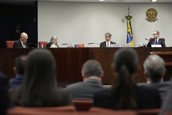 Justices of the Brazilian Supreme Court meet for the verdict and sentencing phase of a trial for those charged in an alleged coup plot to keep Brazil&#039;s former President Jair Bolsonaro in office a ...
