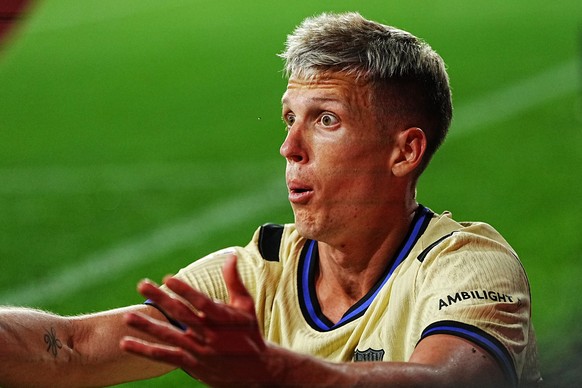Barcelona's Dani Olmo reacts after being pushed by Osasuna's Jon Moncayola during a Spanish La Liga soccer match between Osasuna and Barcelona in Pamplona, Spain, Saturday, May 2, 2026. (AP  ...