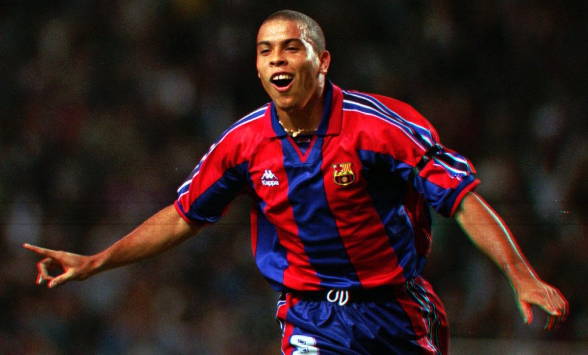 FILE - In this Sept. 12, 1996, file photo, F.C. Barcelona's Brazilian striker Ronaldo celebrates after scoring a goal during a Cup Winner's Cup 1st. round 1st leg soccer match against AEK La ...