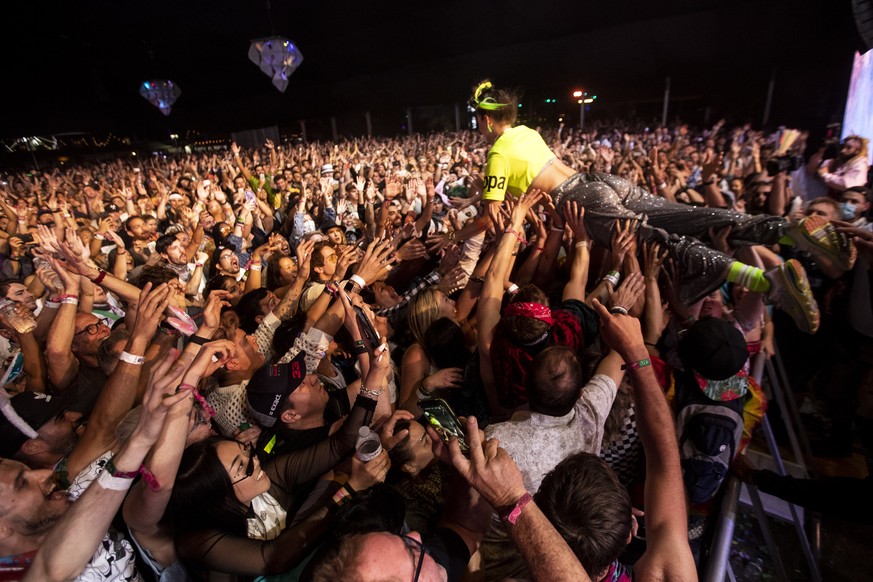 epa07520886 Sofi of US duo Sofi Tukker jumps into crowd while performing during the Coachella Valley Music and Arts Festival in Indio, near Palm Springs, California, USA, 21 April 2019. The festival r ...