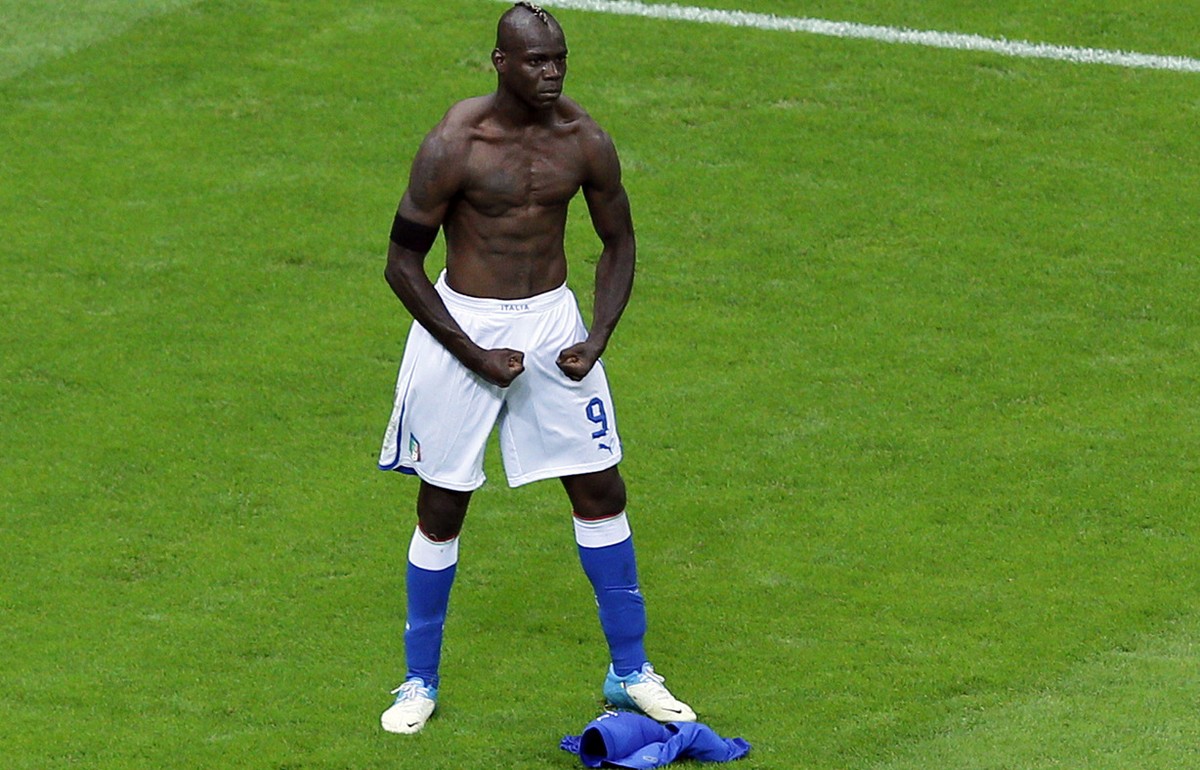 Italy's Mario Balotelli celebrates scoring his side's second goal during the Euro 2012 soccer championship semifinal match between Germany and Italy in Warsaw, Poland, Thursday, June 28, 201 ...