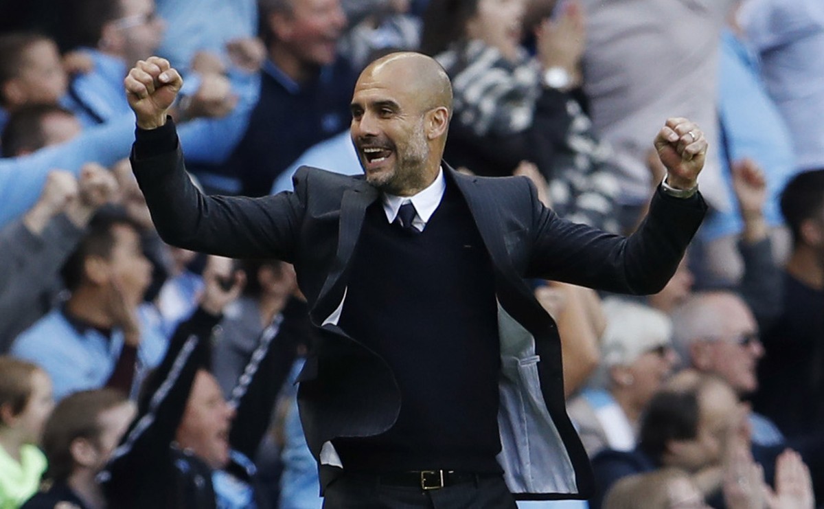Britain Football Soccer - Manchester City v Sunderland - Premier League - Etihad Stadium - 13/8/16
Manchester City manager Pep Guardiola celebrates Sunderland's Paddy McNair scoring a own goal a ...
