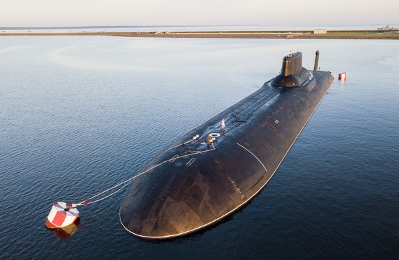 FILE - The Russian nuclear submarine Dmitry Donskoy moored near Kronstadt, a seaport town 30 km (19 miles) west of St. Petersburg, Russia on Saturday, July 29, 2017. Russian President Vladimir Putin h ...