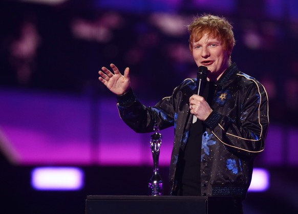 Ed Sheeran on stage after winning songwriter of the year at the Brit Awards 2022 in London Tuesday, Feb. 8, 2022. (Photo by Joel C Ryan/Invision/AP)