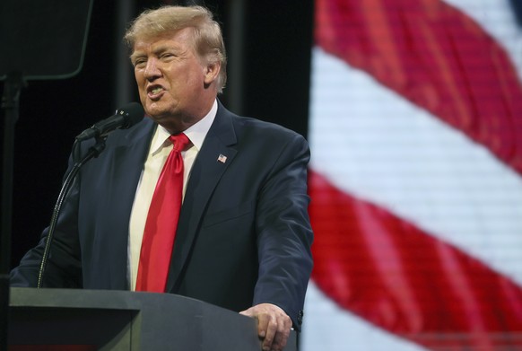 Former President Donald Trump speaks to the crowd gathered at the Landers Center in Southaven, Miss., on Saturday, June 18, 2022. (Joe Rondone/The Commercial Appeal via AP)
