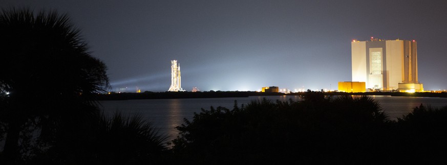 epa10125161 A handout picture made available by the National Aeronautics and Space Administration (NASA) shows NASA?s Space Launch System (SLS) rocket with the Orion spacecraft aboard is seen atop the ...