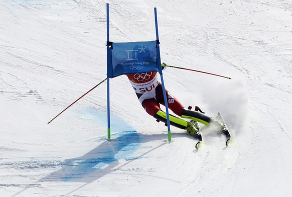 Switzerland's Ramon Zenhaeusern skis during the alpine team event at the 2018 Winter Olympics in Pyeongchang, South Korea, Saturday, Feb. 24, 2018. (AP Photo/Michael Probst)