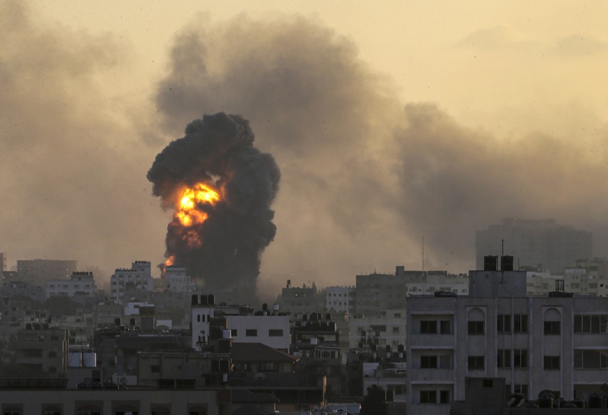 epa10955052 Smoke and flames rise after an Israeli attack on the Tal Al Hawa neighborhood of Gaza City, November 2, 2023. More than 9,000 Palestinians and at least 1,400 Israelis have been killed, ...