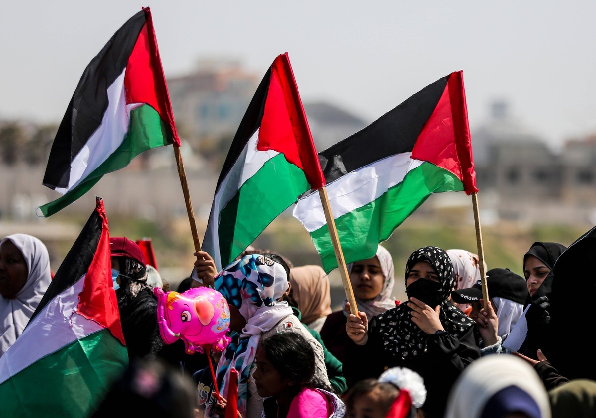 March 30, 2022, Gaza City, Gaza Strip, Palestine: Gaza, Palestinian Territories. 30 March 2022. Palestinians commemorate the 46th anniversary of Land Day during a rally at the port in Gaza City, in th ...