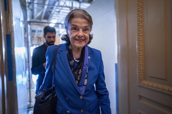 FILE - Senator Dianne Feinstein, D-Calif., walks through a Senate corridor at the Capitol in Washington, Feb. 14, 2023. The senior member of Congress has been hospitalized in San Francisco with a case of…